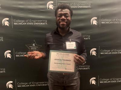 Man holding award